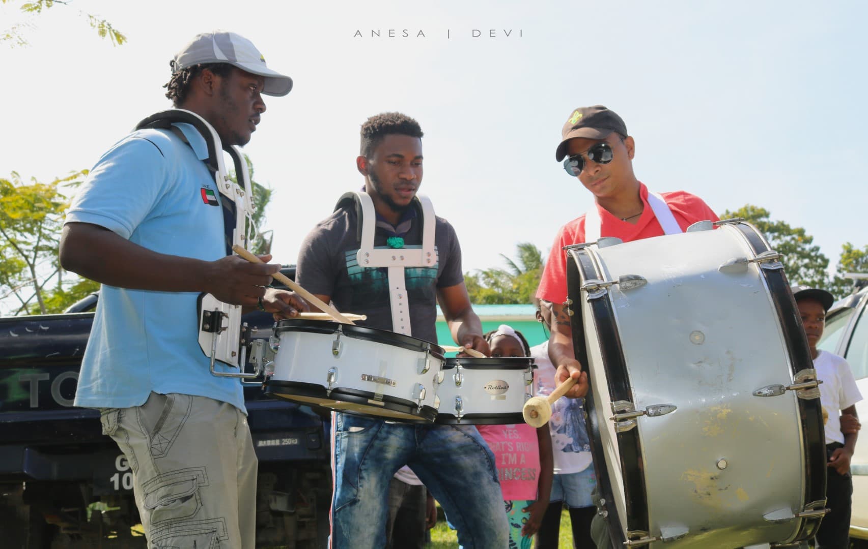 Scout leaders playing drums and having fun