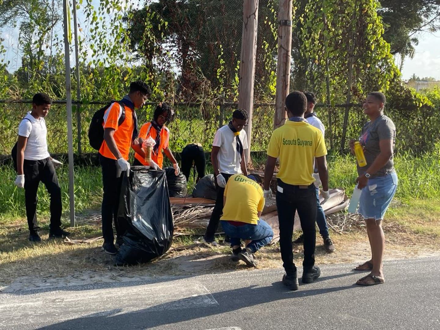 Scouts engaging in a clean up campaign